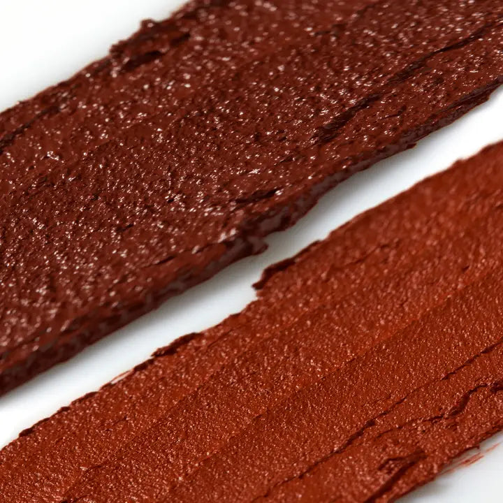 Close-up swatch of Axiology Strawberry and Cherry Balmie Duo, showing rich, pigmented color with a smooth, hydrating finish.